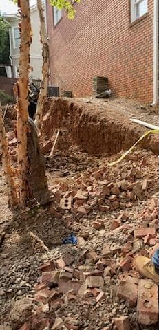 Strategic Home Division: Installing a Fresh Brick Wall for Enhanced Privacy and Distinctive Separation